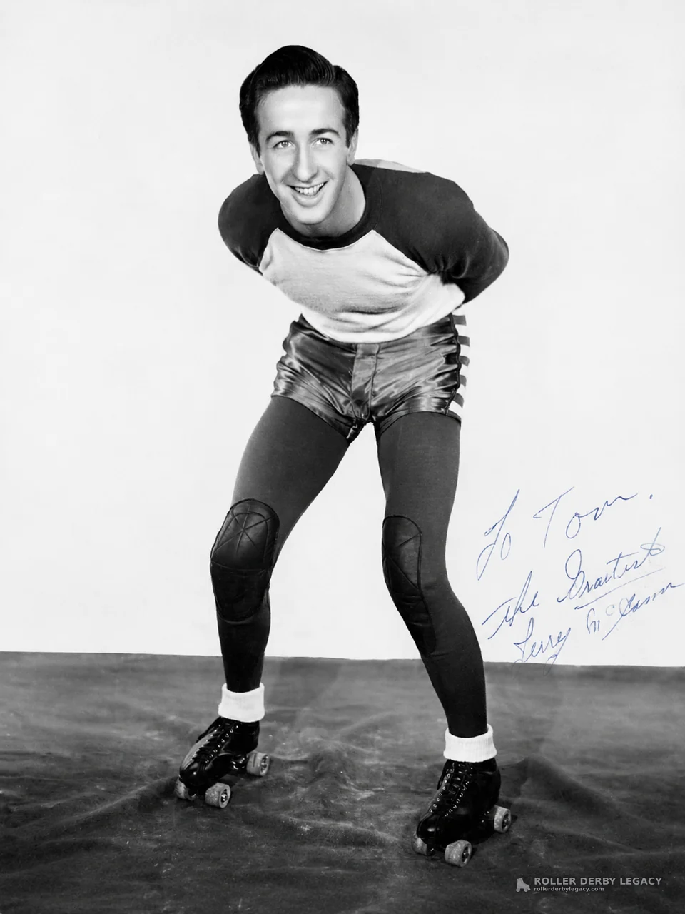 Inscribed studio portrait of a smiling roller skater