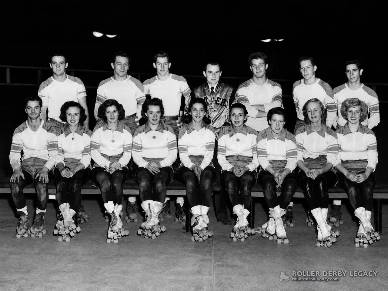 Roller Skaters Posed in Indoor Arena Group Portrait