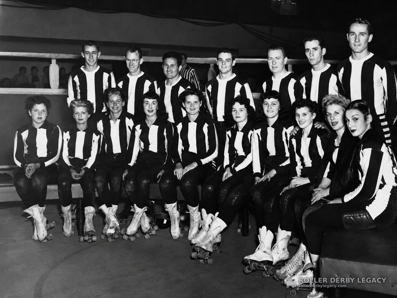 Roller Skaters in Striped Uniforms at an Indoor Rink