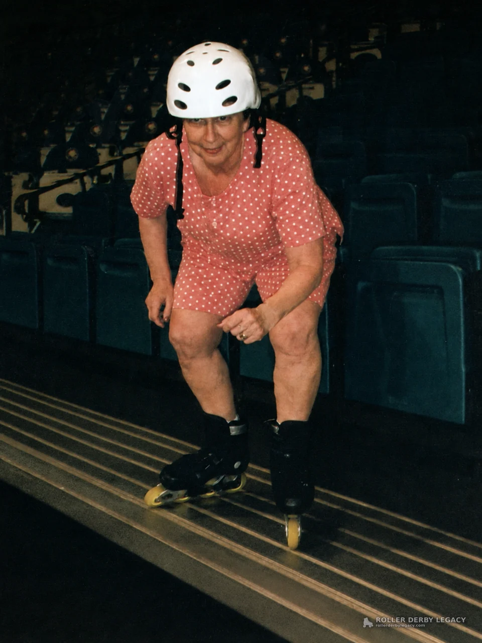 Helmeted Skater in Pink Polka-Dot Outfit