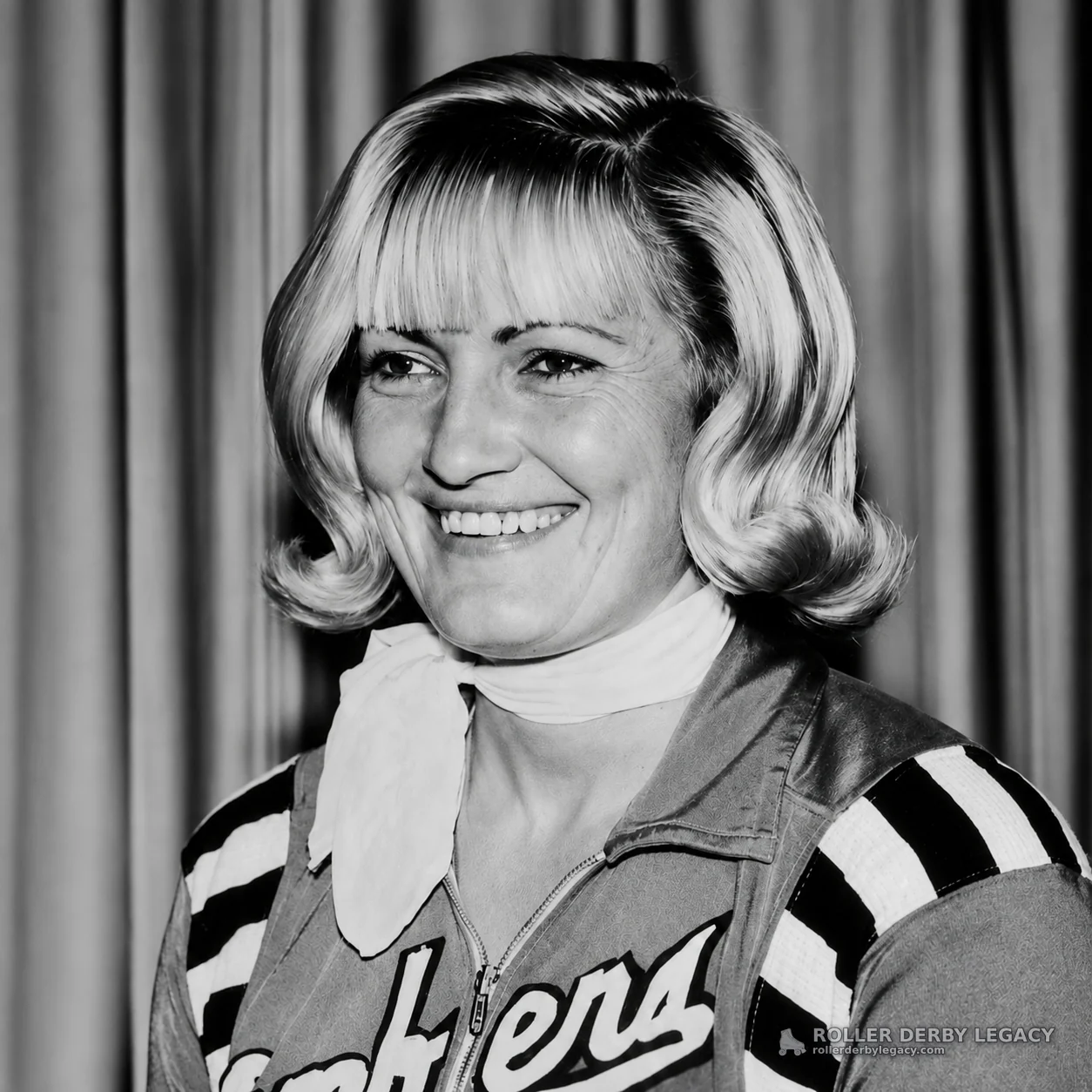 Smiling Skater Portrait in Striped-Sleeve Uniform