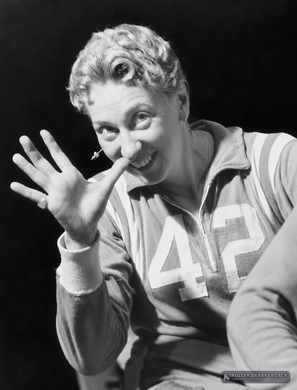 Smiling Portrait in Number 42 Athletic Uniform
