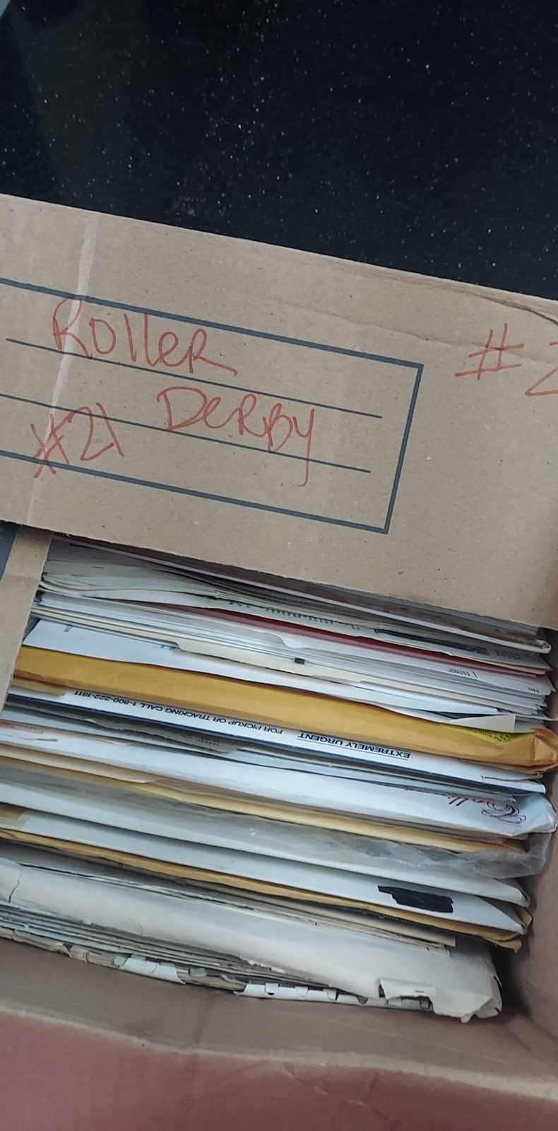 A box of labeled paper envelopes from the collection.